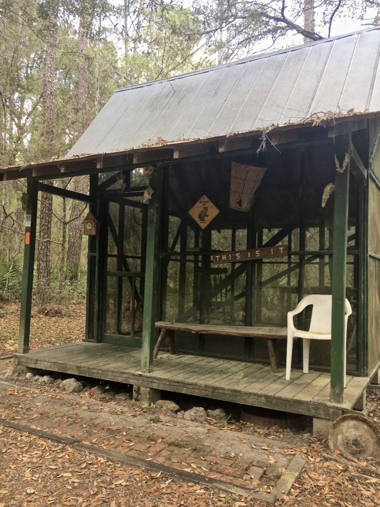 Small screened cabin with porch on the Florida Trail near White Springs.