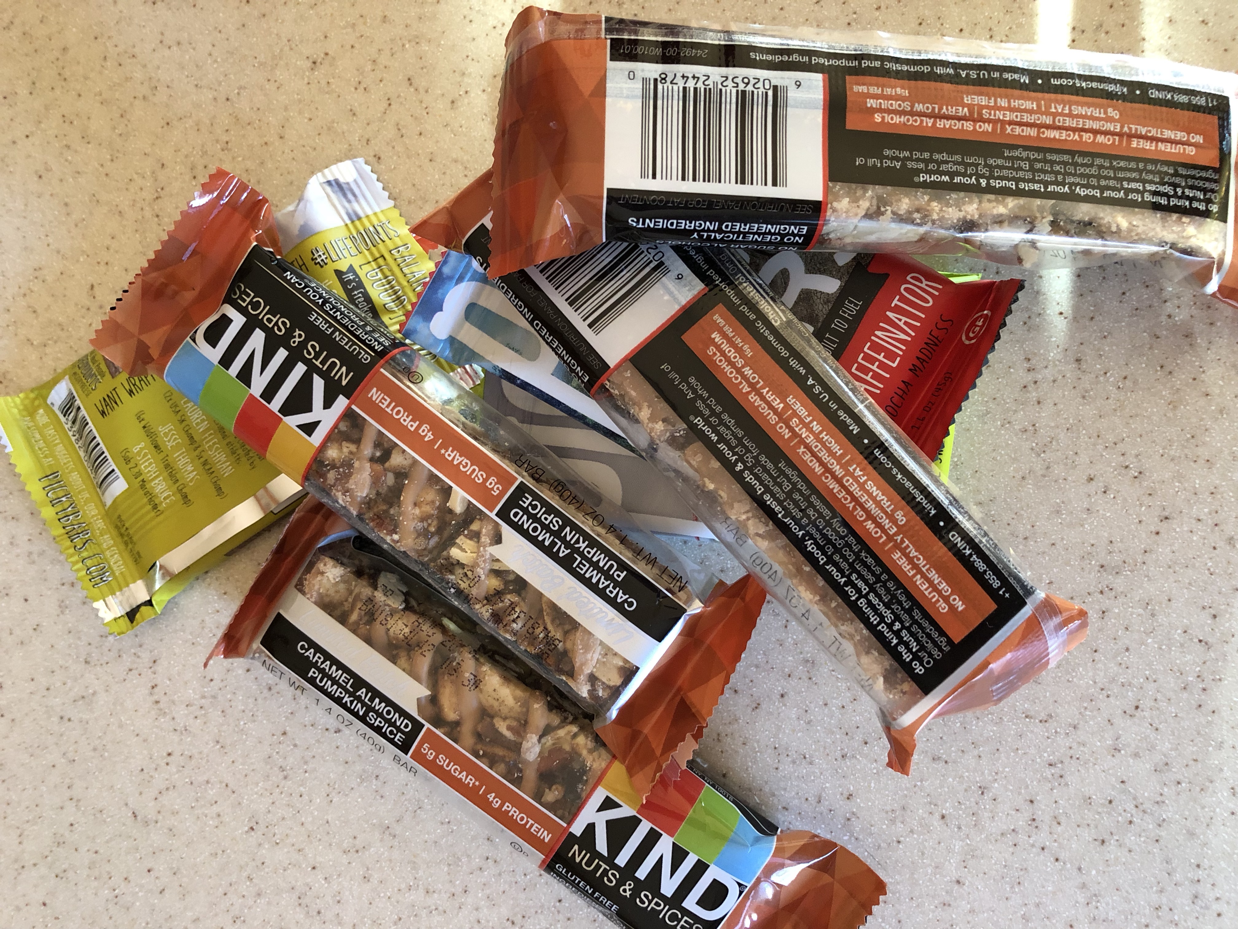 Bunch of energy bars tossed together in a pile to fuel hiking many miles.