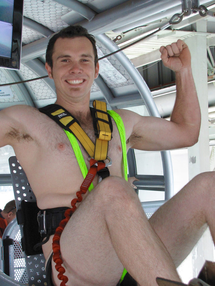 Man in Borat suit ready to bungy jump in New Zealand, home of extreme sports.
