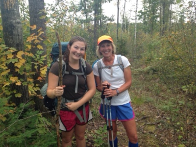 Two female hikers posing on the trail.