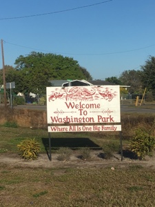 Road sign saying, "Welcome to Washington Park."