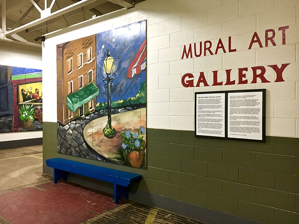Eau Claire's Mural Art Gallery entrance featuring painting on wall.
