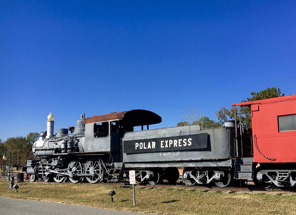 Train labeled Polar Express sitting on tracks near SR 71 in Florida