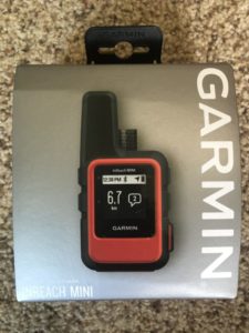 Box with a Garmin inReach mini satellite communication device, good as a gift for fathers and men.