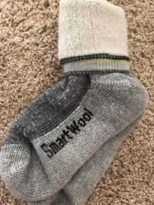 Pair of SmartWool socks, good as a gift for fathers and men.