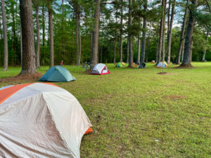 Group of tents set up at an interpretive pullout on the Natchez Trace.