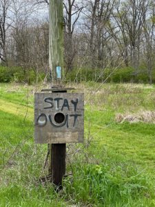 Sign saying "Stay Out."