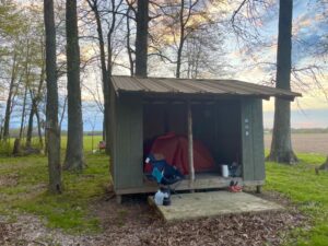 Camping shelter in the woods.